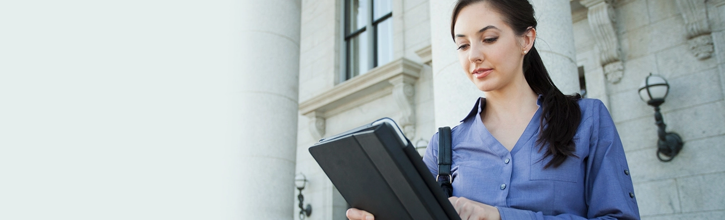 Woman using tablet device