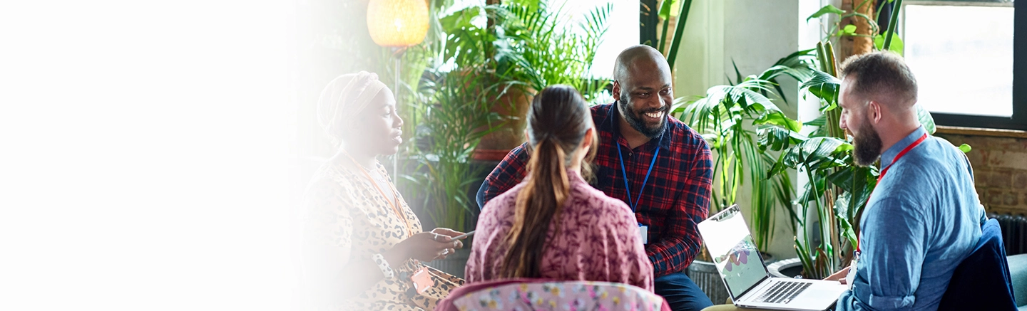 People in a meeting and smiling