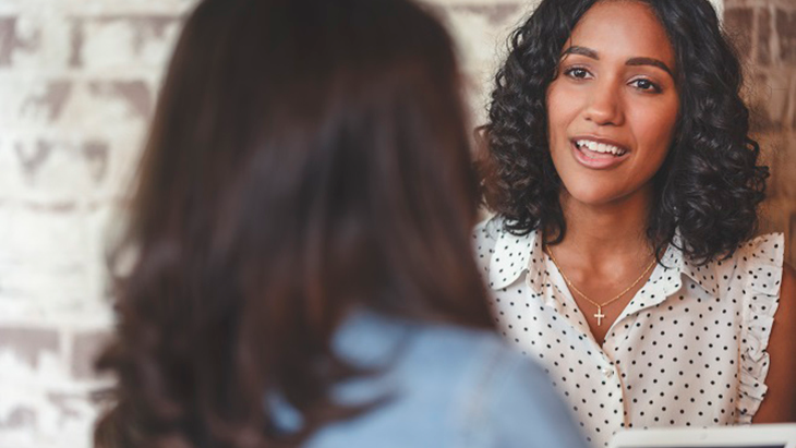 Two women talking