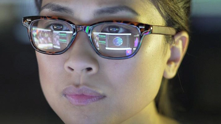 Close-up of young woman wearing glasses